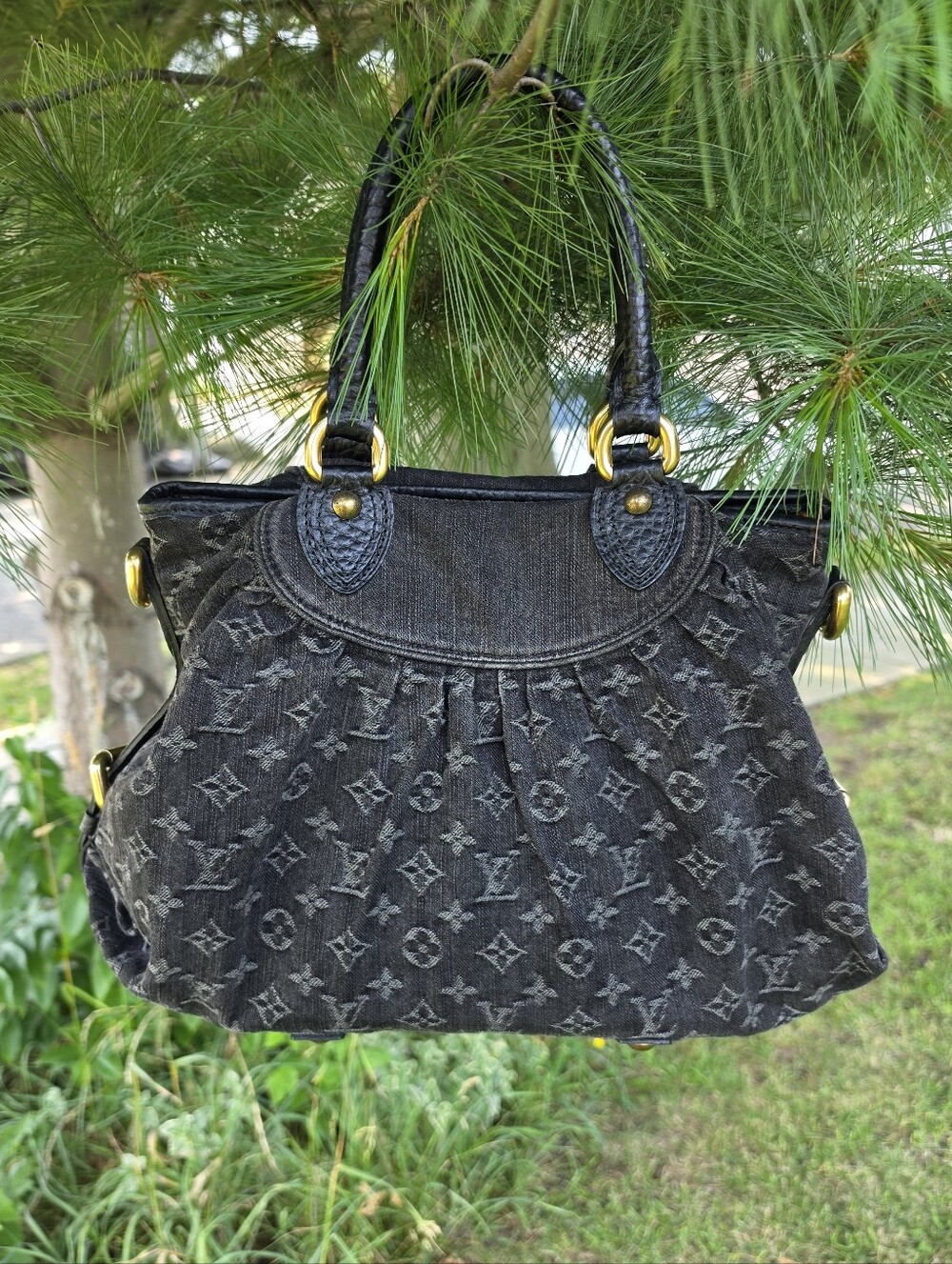 Louis Vuitton Monogram Denim Neo Cabby MM tonewashed denim.